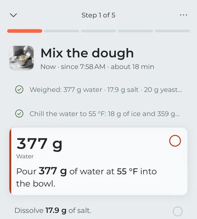 Cooking mode on the first step, “Mix the dough”: weighing out and chilling the water are ticked off, and the water to pour now is in focus, its grams in large type.